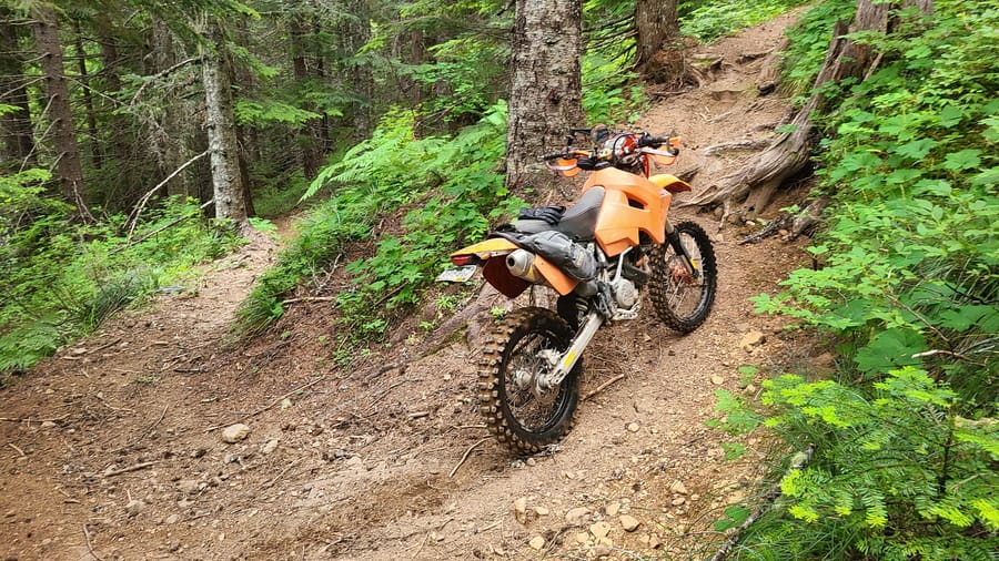 motorcycle parked at a hairpin turn