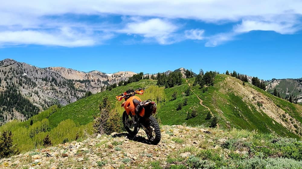 motorcycle parked atop a peak