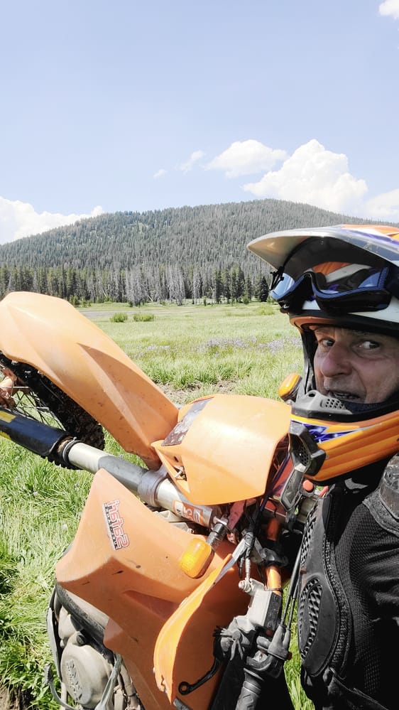 selfie with a motorcycle in upright position