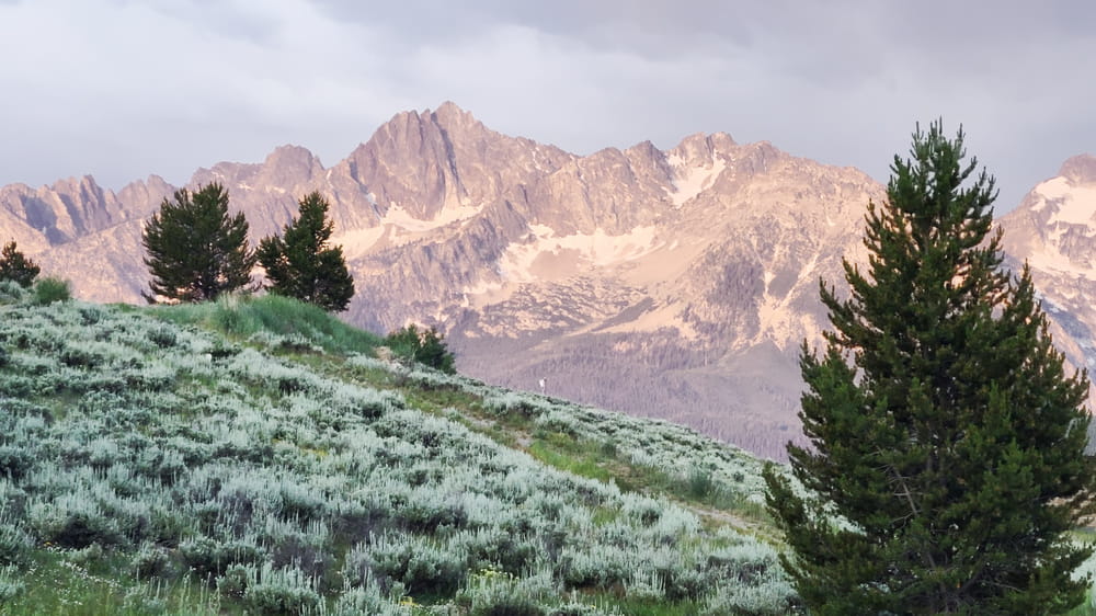 mountains glowing red color in early morning sun