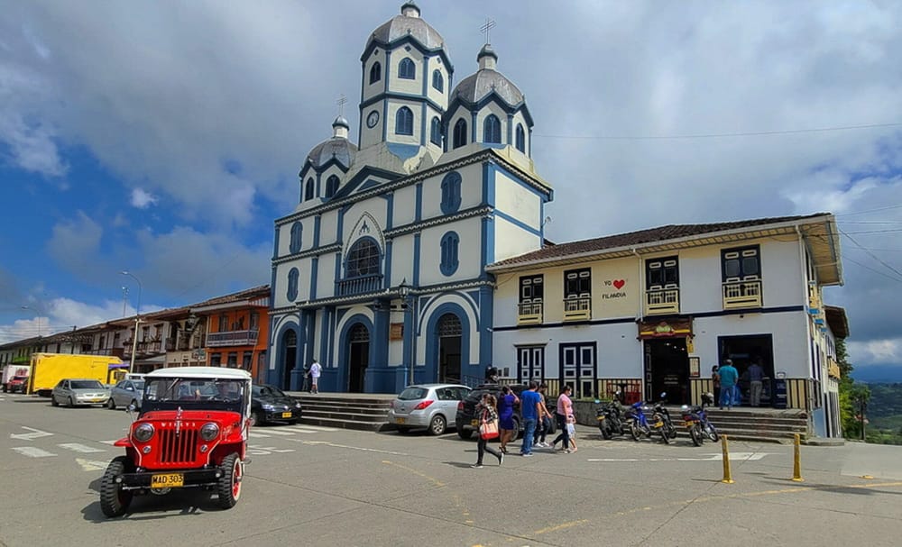 red jeep in front of a church
