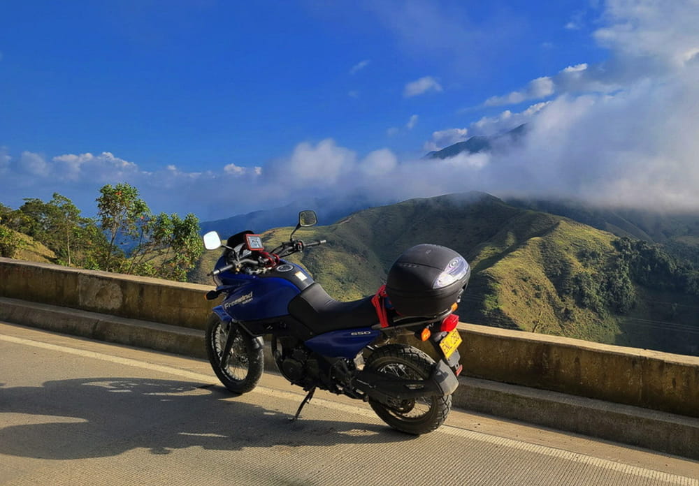 motorcycle parked high up in the mountains