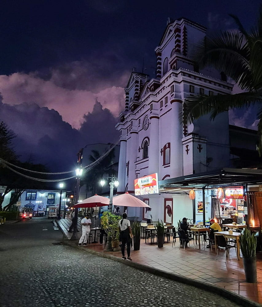 Cathedral and stormy clouds behind at dusk