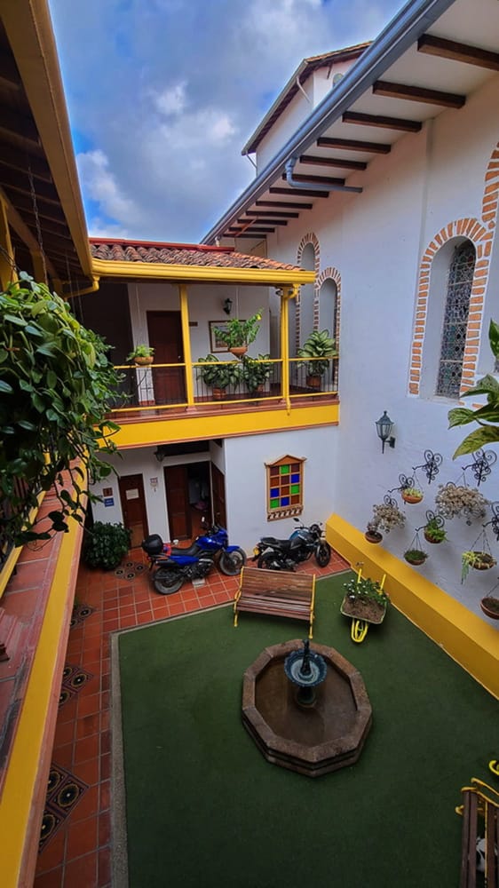  motorcycle parked in an innoer courtyard