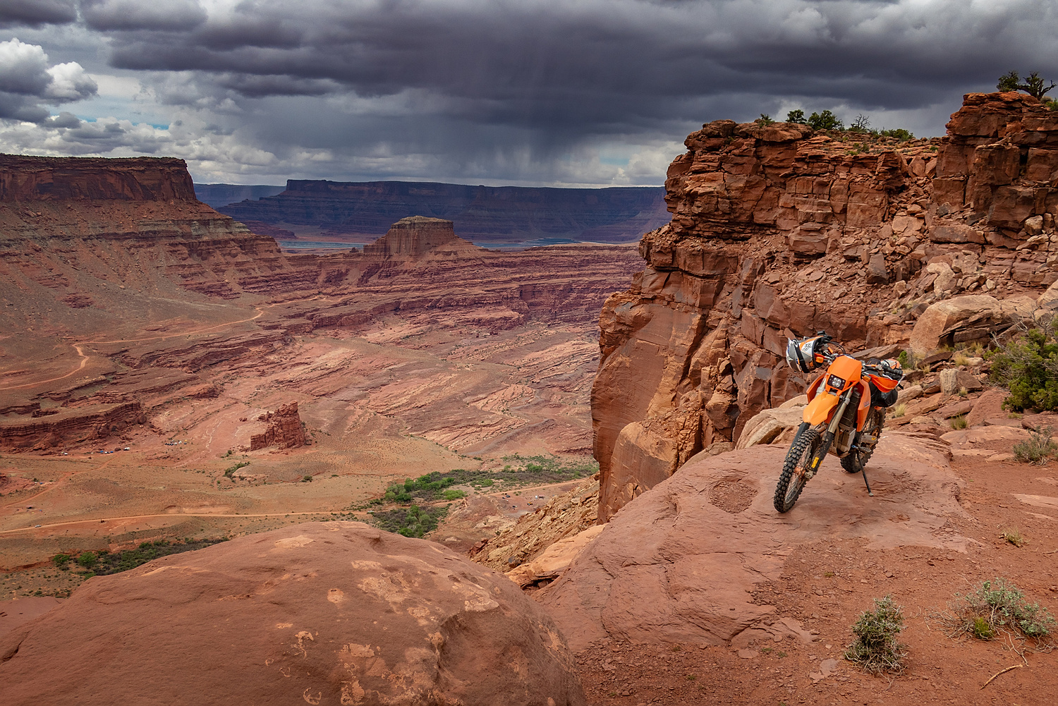 motorcycle parked at the edge of a canyon