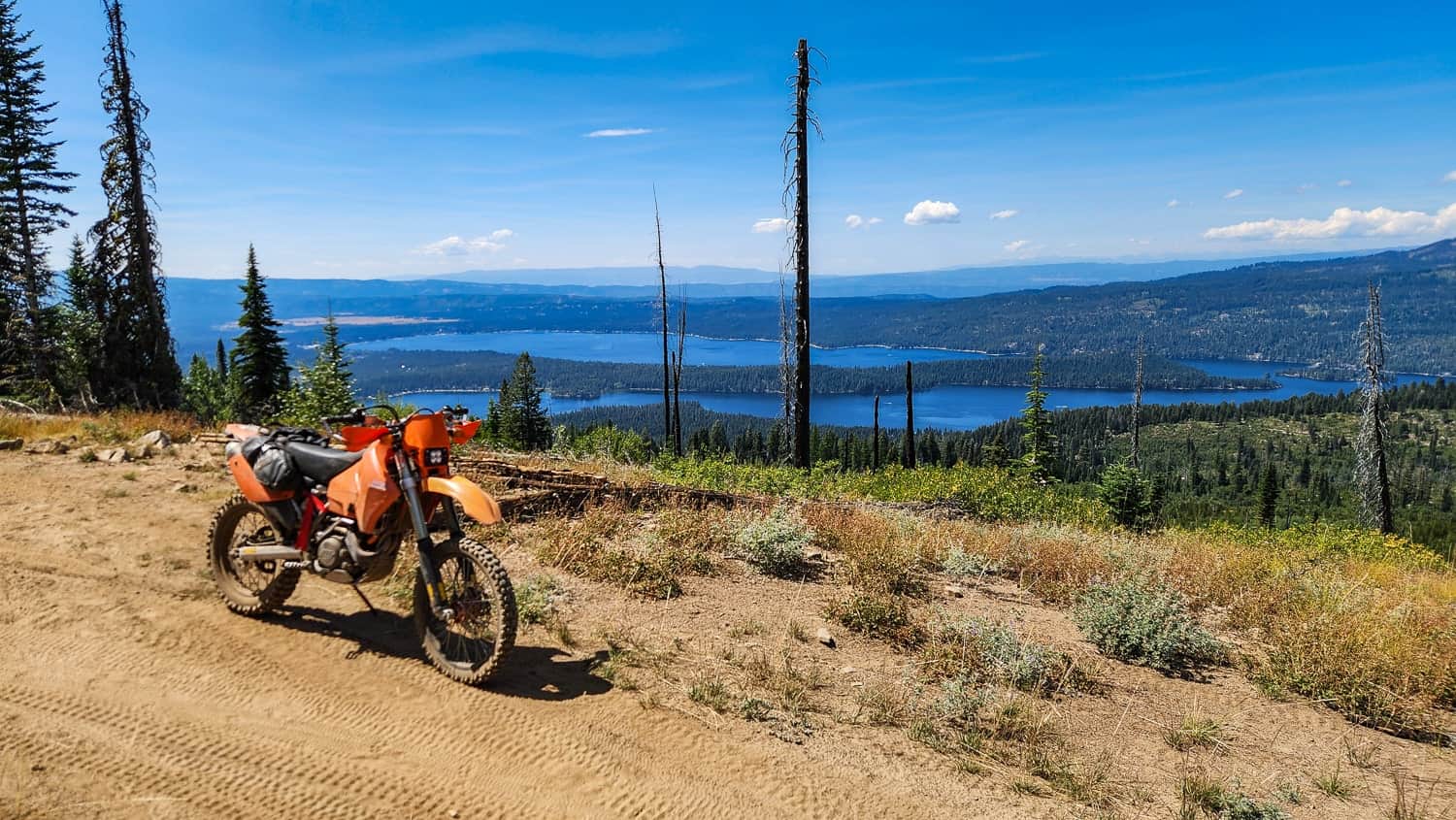 motorcycle and mountain range behind