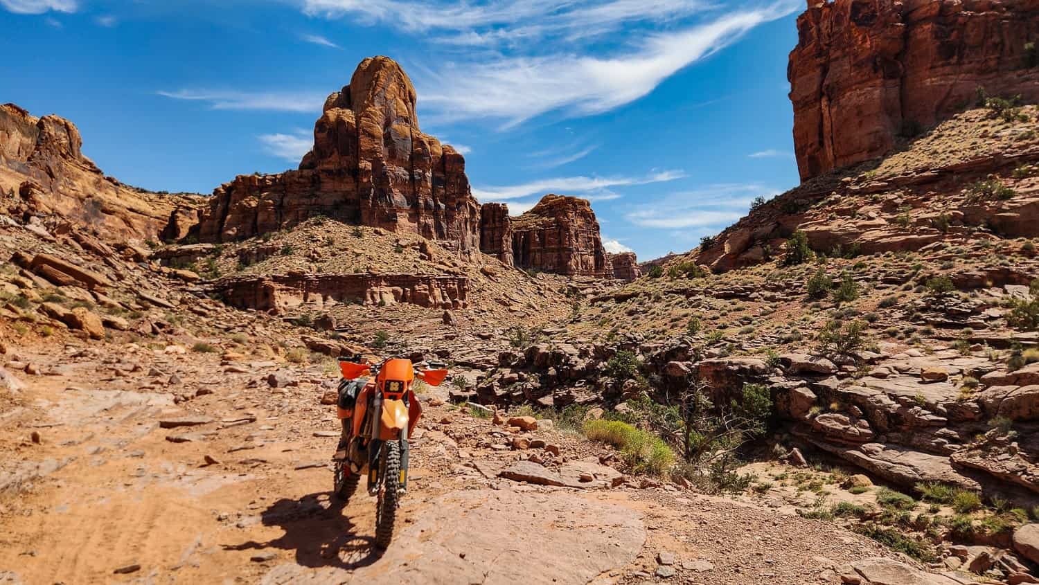 motorcycle inside a canyon with vertical walls