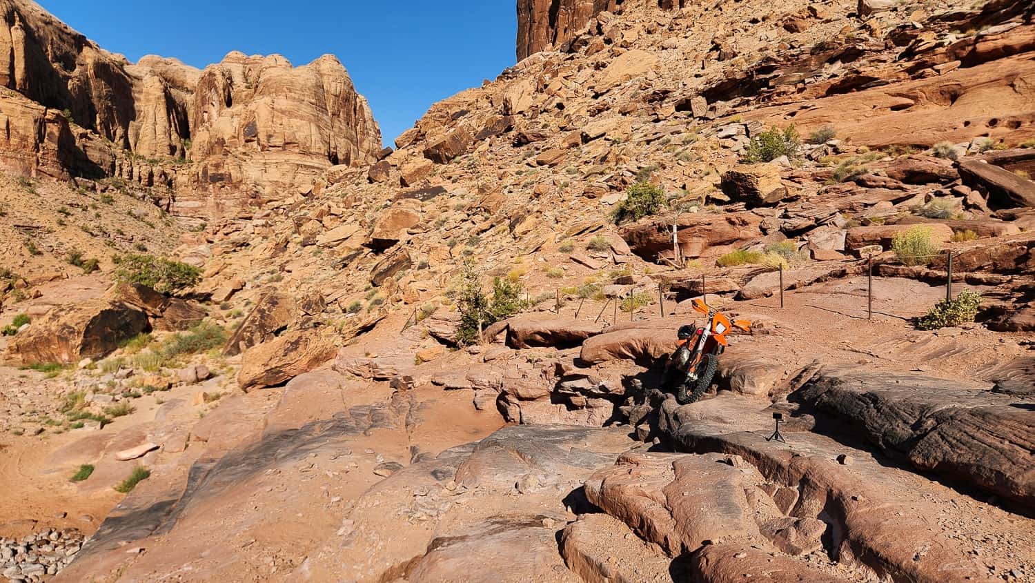 motorcycle parked rock ledge steps