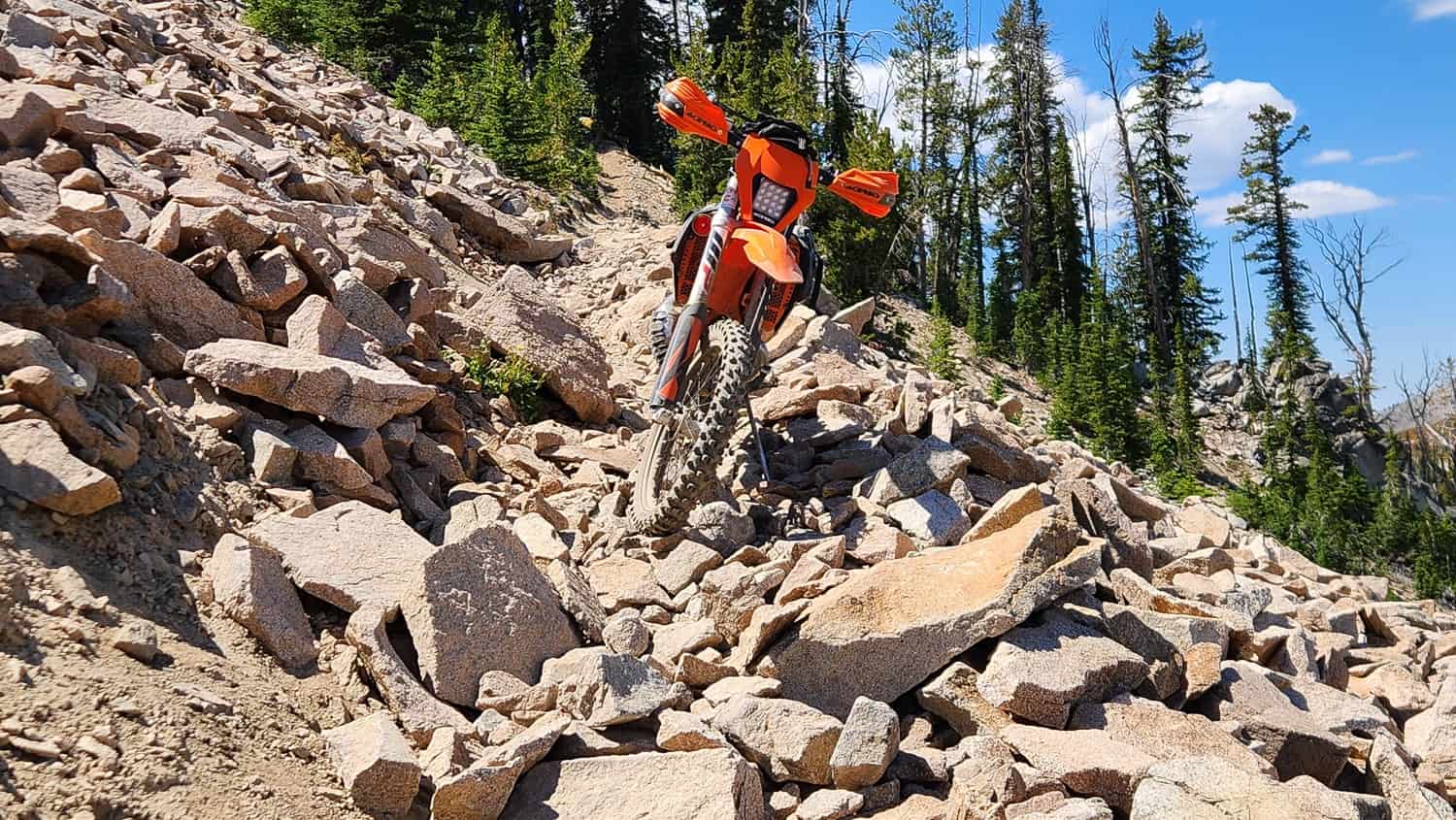 motorcycle on a steep rocky trail