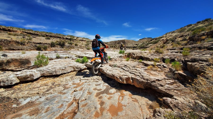 rider going over a rock step