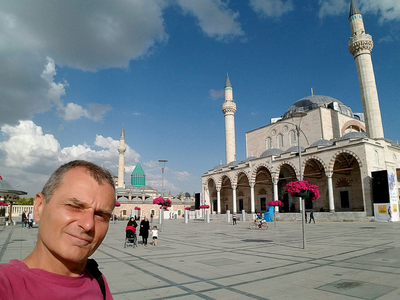 selfie with two mosques behind