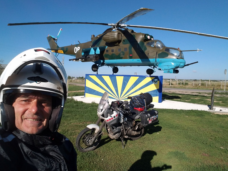 selfie with a military chopper behind