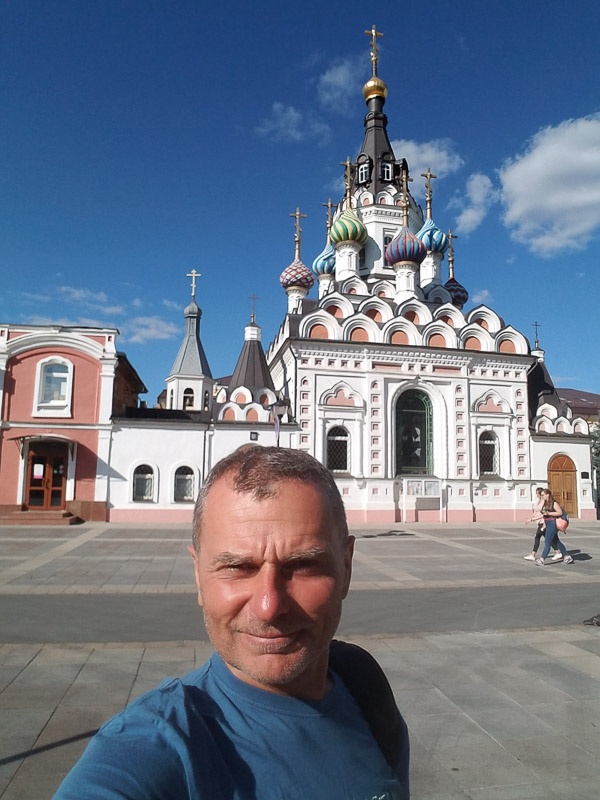 selfie in front of a decorated Russian church