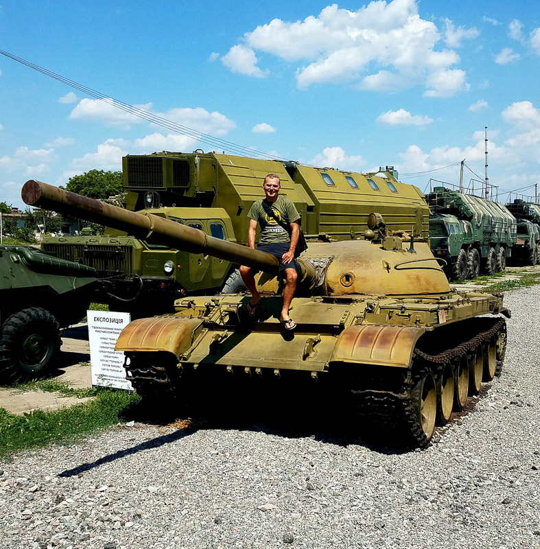 sitting atop a tank