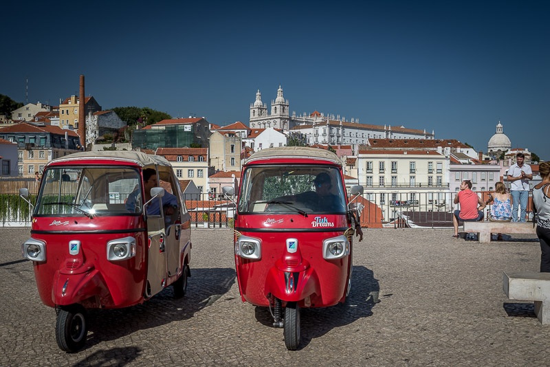 two red tuk-tuks