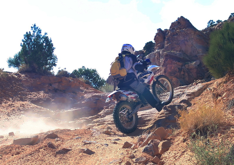 rider going up steep rock